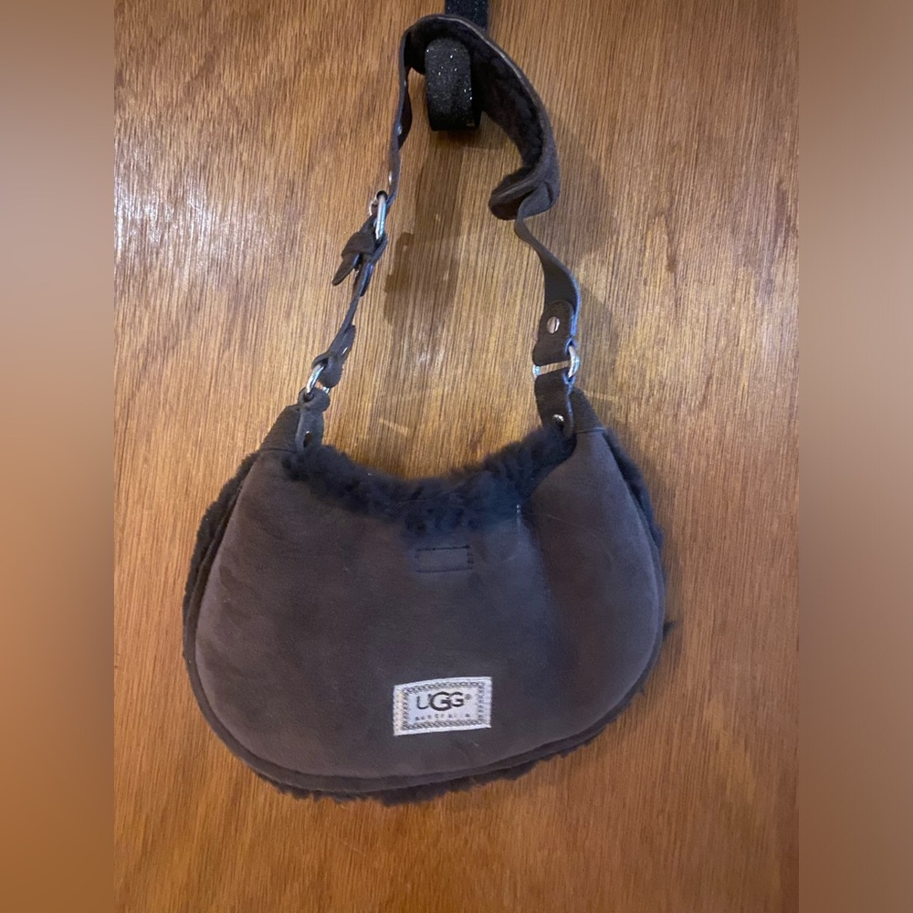 Ugg Australia purse never used, white cover bag included